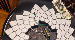 A handmade LED panel with exposed circuit boards and wiring