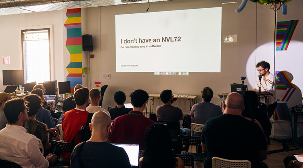 Recursers watching a presentation at the Hub