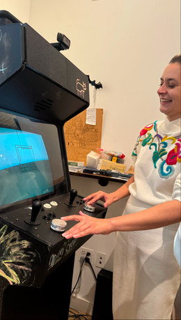 A Recurser playing a game on the RCade